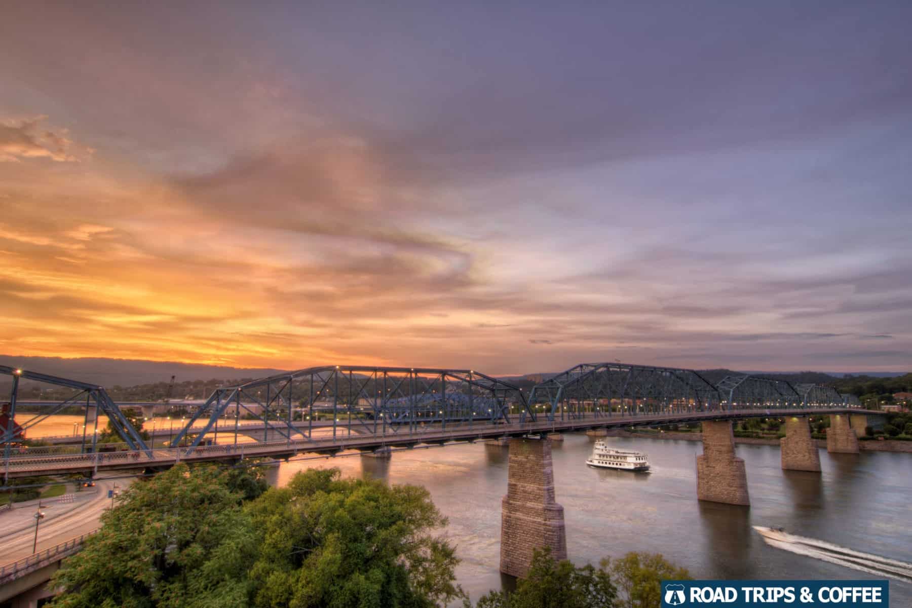 Vibrant orange sunset across the Walnut Street Bridge and Tennessee River in Chattanooga, Tennessee