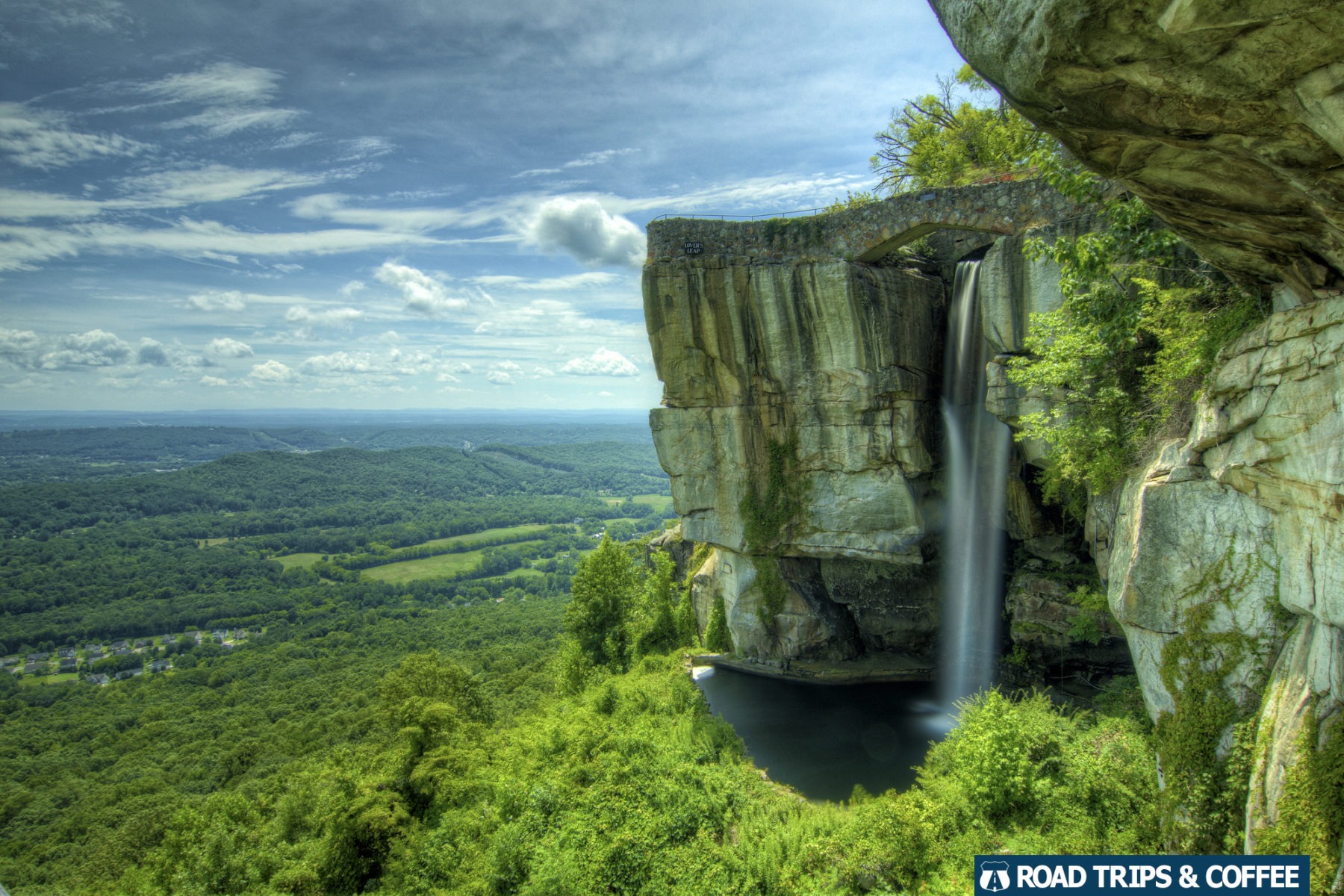 A waterfall on the edge of a mountain at Rock City in Lookout Mountain, Tennessee