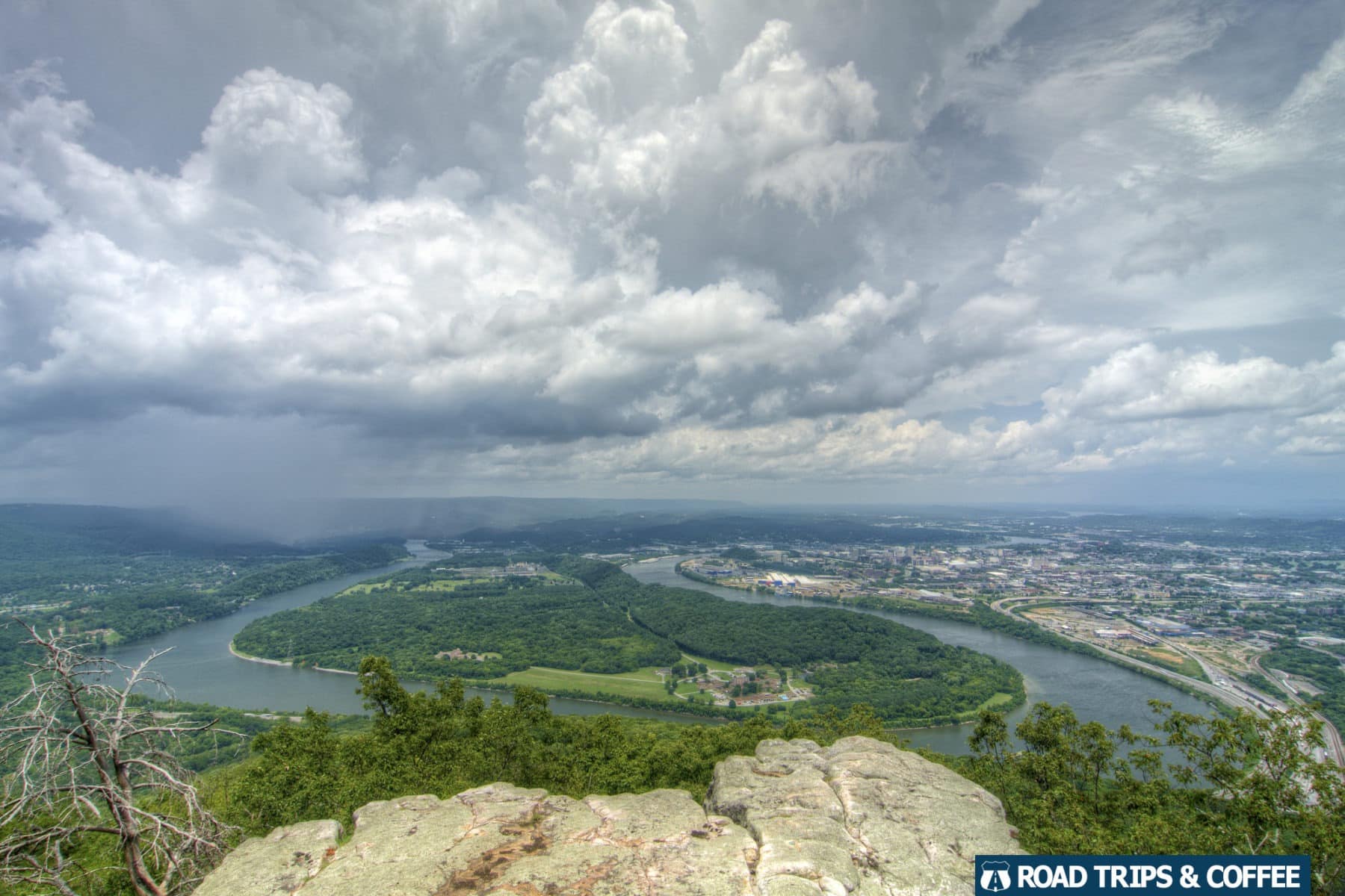 A summer thunderstorm passes across the bend in the Tennessee River heading for downtown Chattanooga, Tennessee